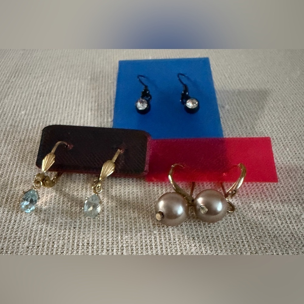 Three totally unique earrings.